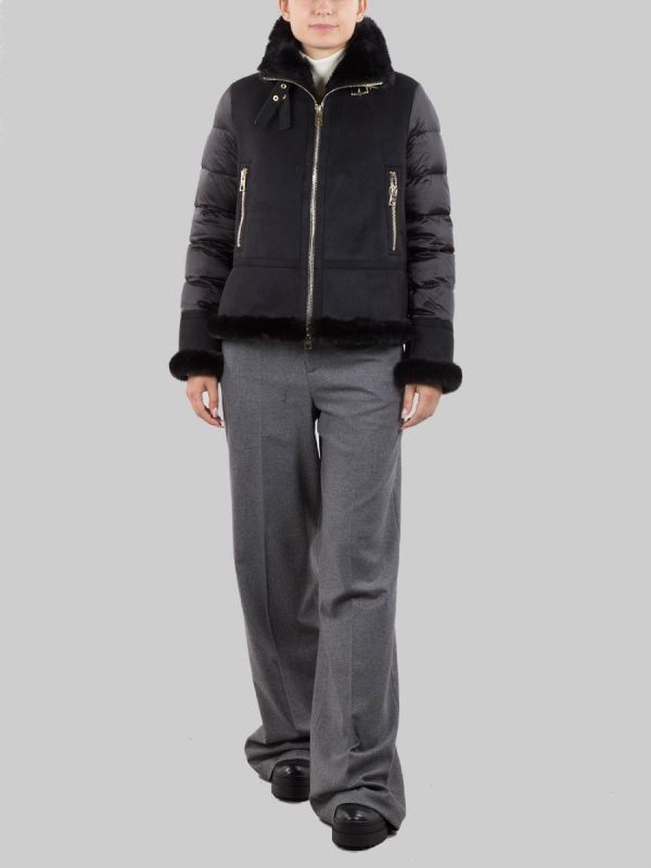 Acquista GIUBBOTTO NERO IN ECO MONTONE E PIUMINO CON INSERTI IN