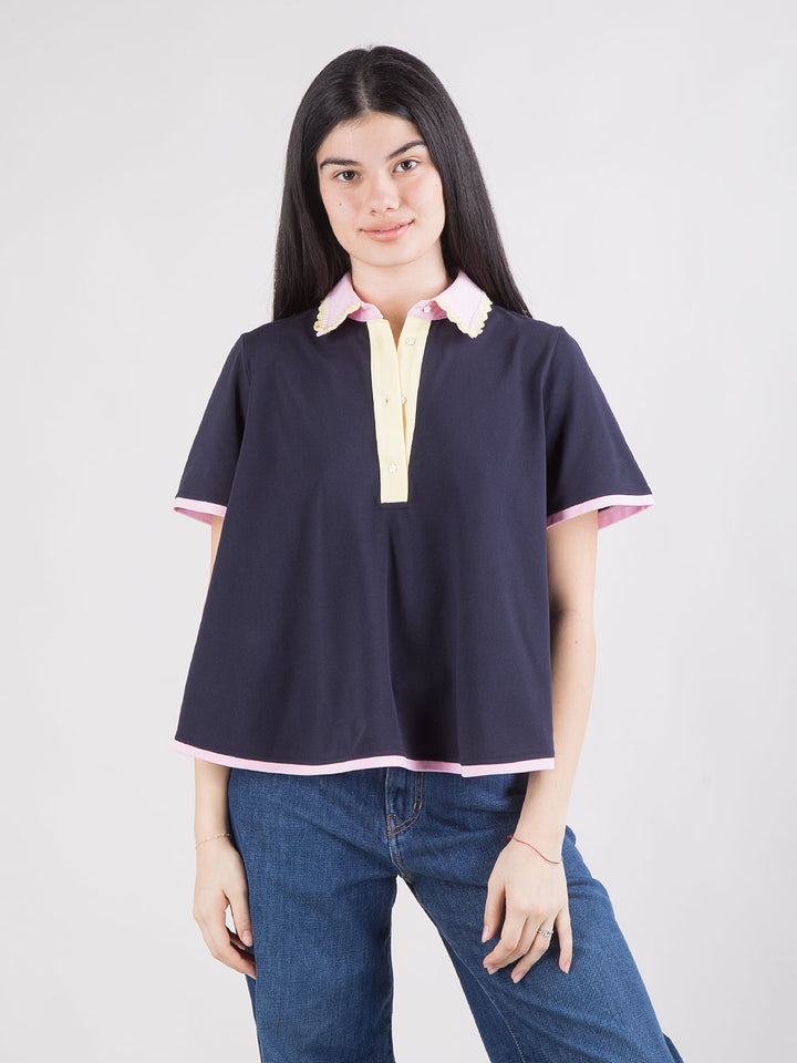 Polo blu con colletto bicolore