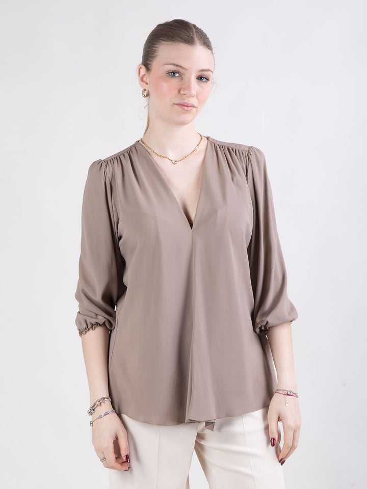 Blusa con scollo a V