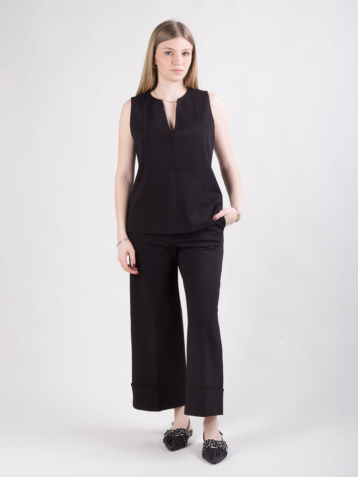 Pantalone nero con risvolto alto