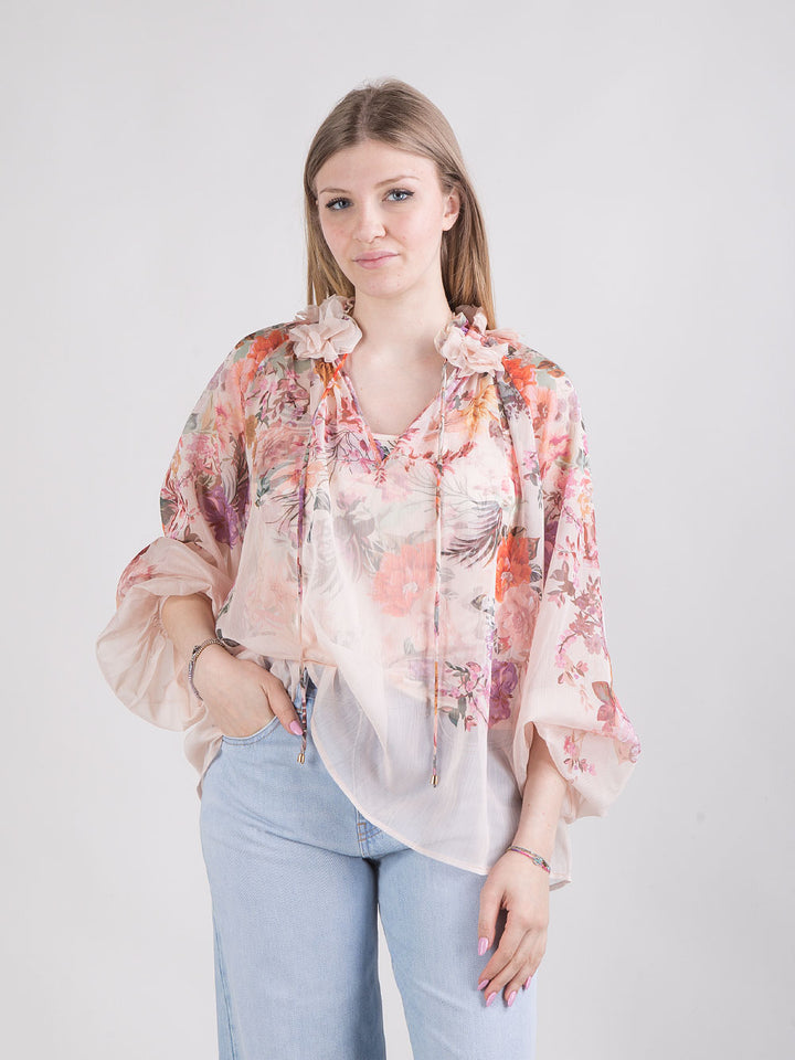Blusa trasparente a fantasia floreale con top abbinato