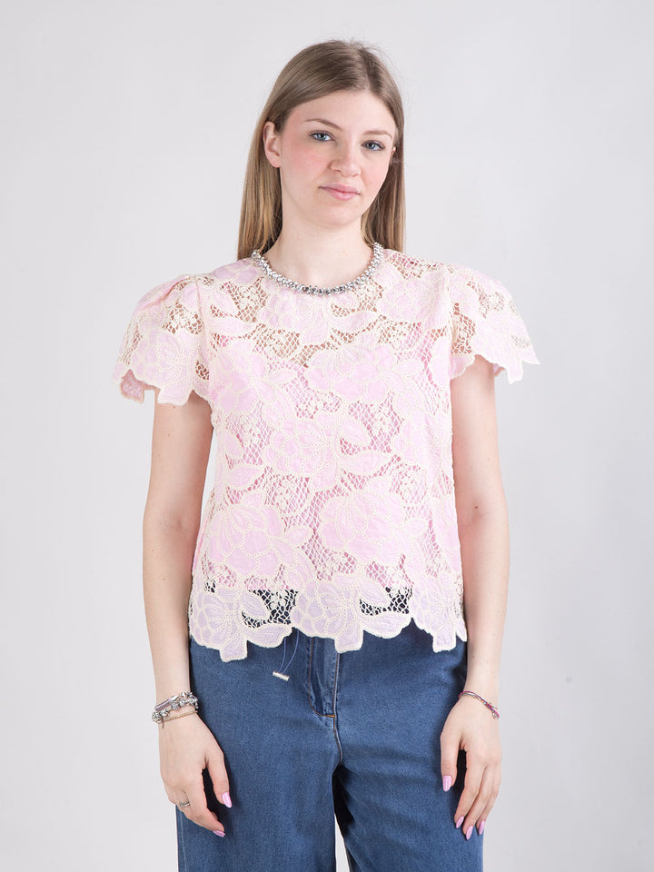 Blusa in pizzo con strass sul collo