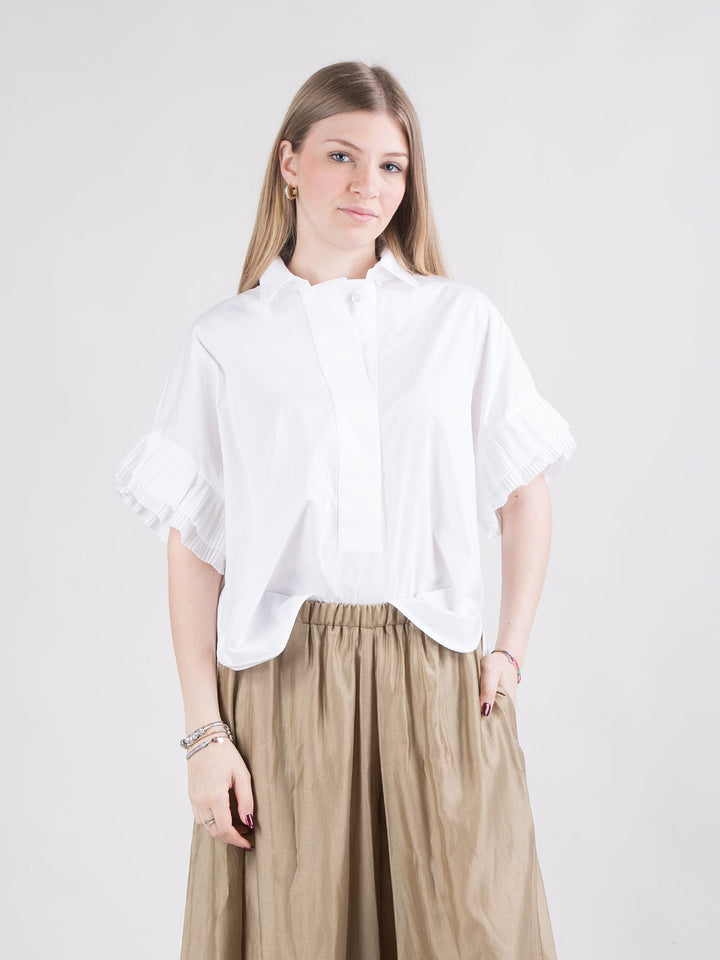 Camicia stile polo con dettagli plissettati