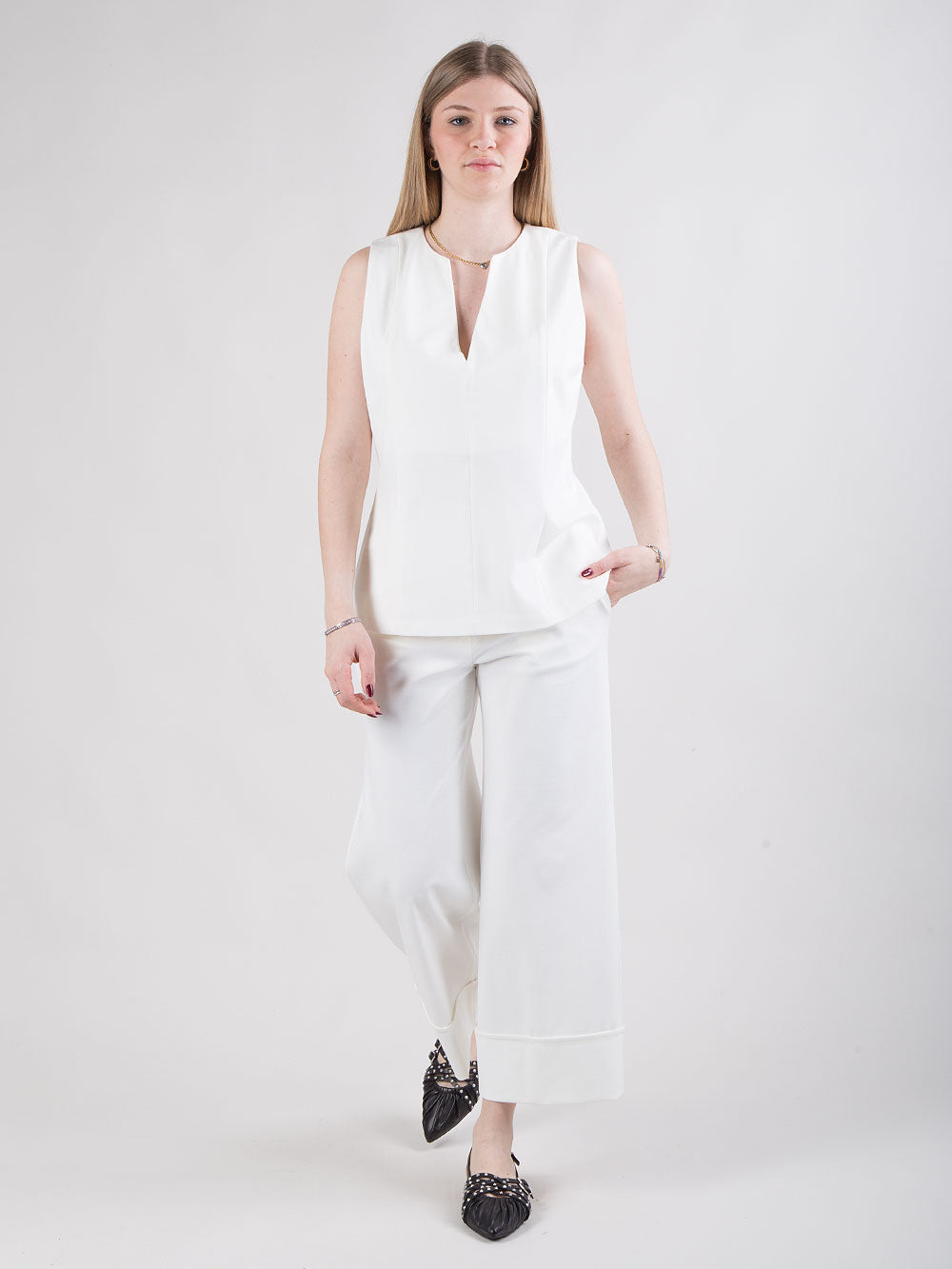 Pantalone bianco con risvolto alto