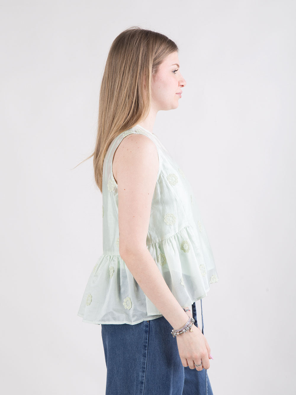 Blusa rosa con fiori a rilievo