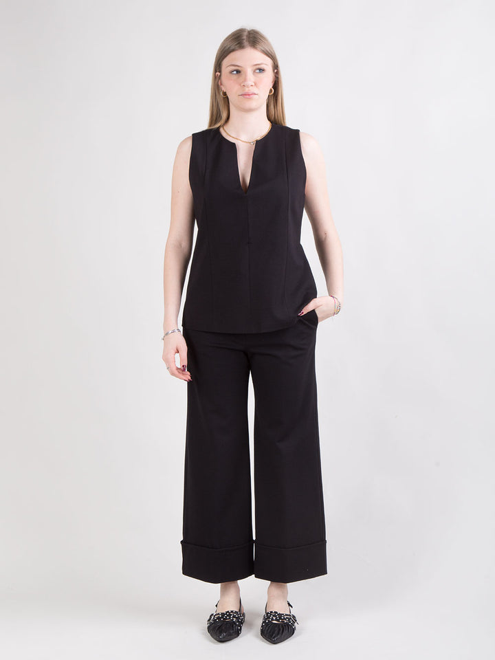 Pantalone nero con risvolto alto