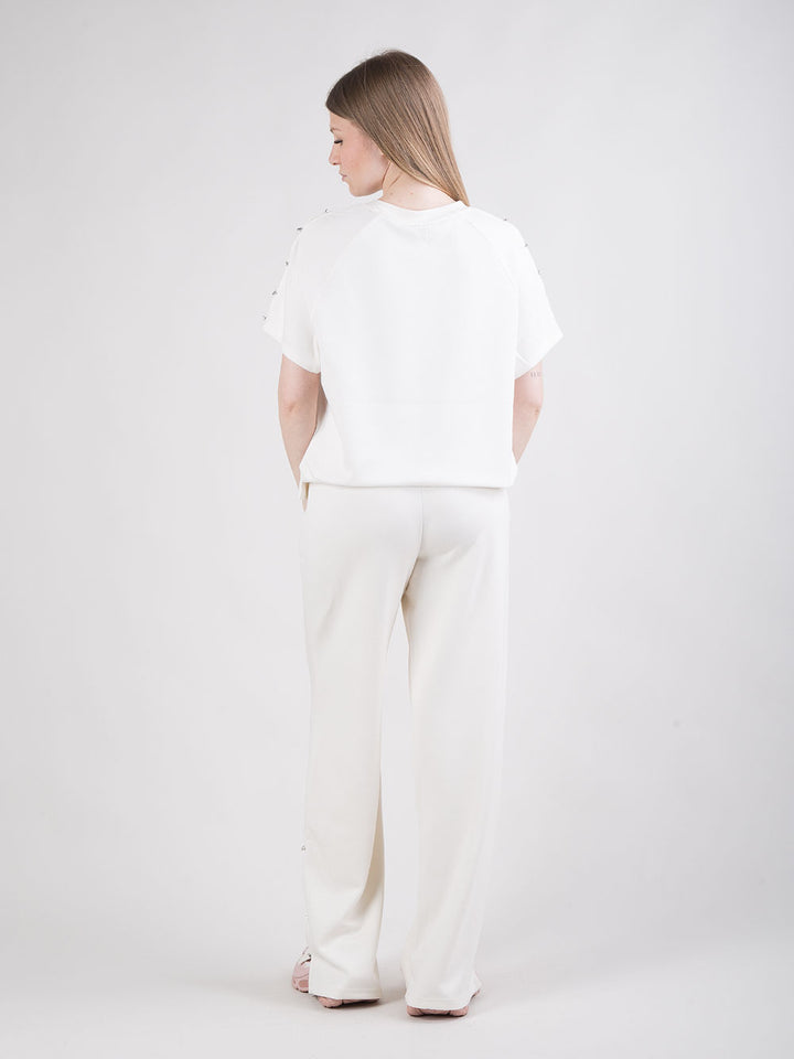 Pantalone ampio con spacchi