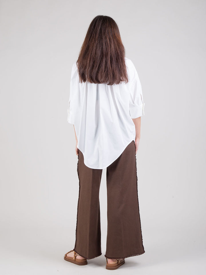 Pantaloni con frange