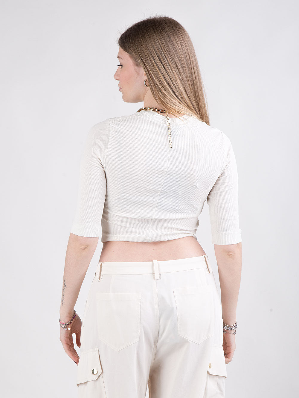 Maglia cropped con catena