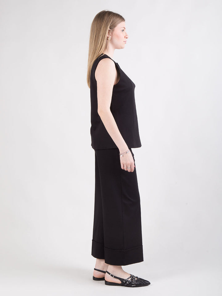 Pantalone nero con risvolto alto