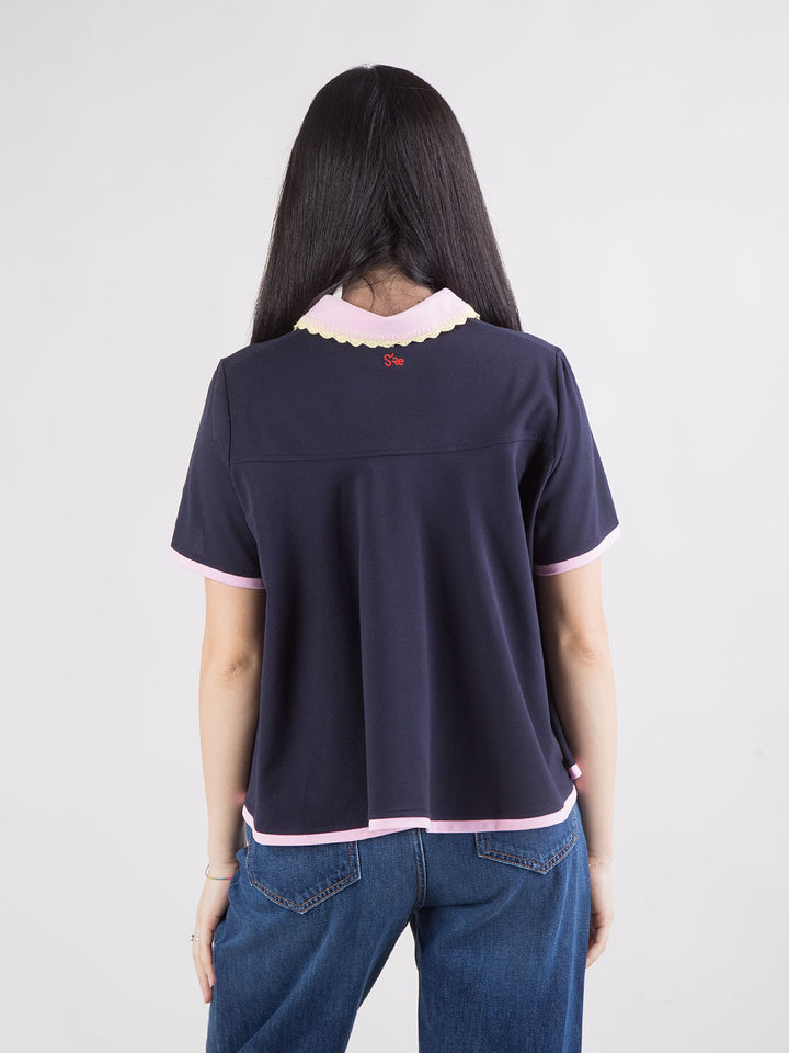Polo blu con colletto bicolore