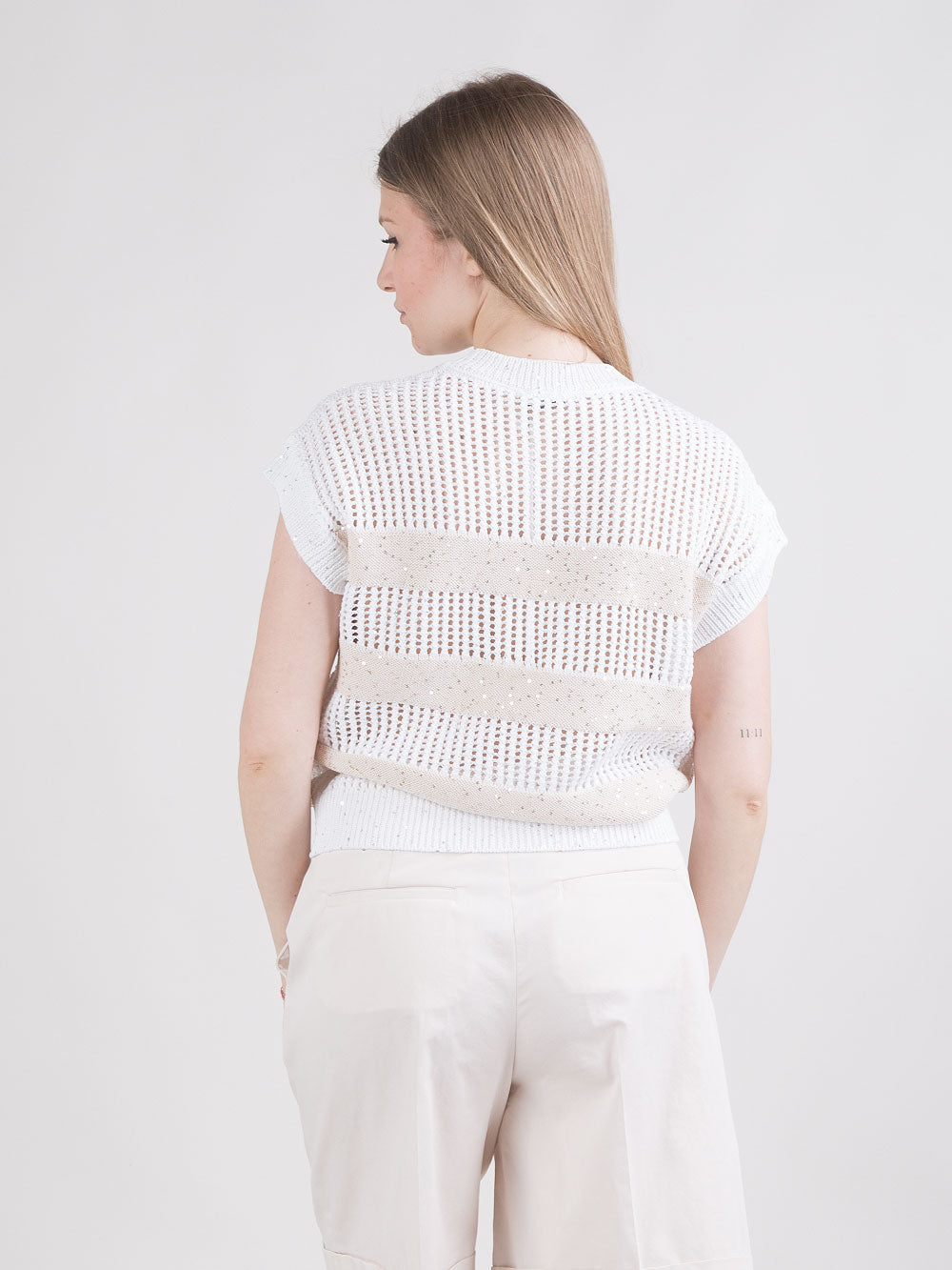 Gilet con micropaillettes