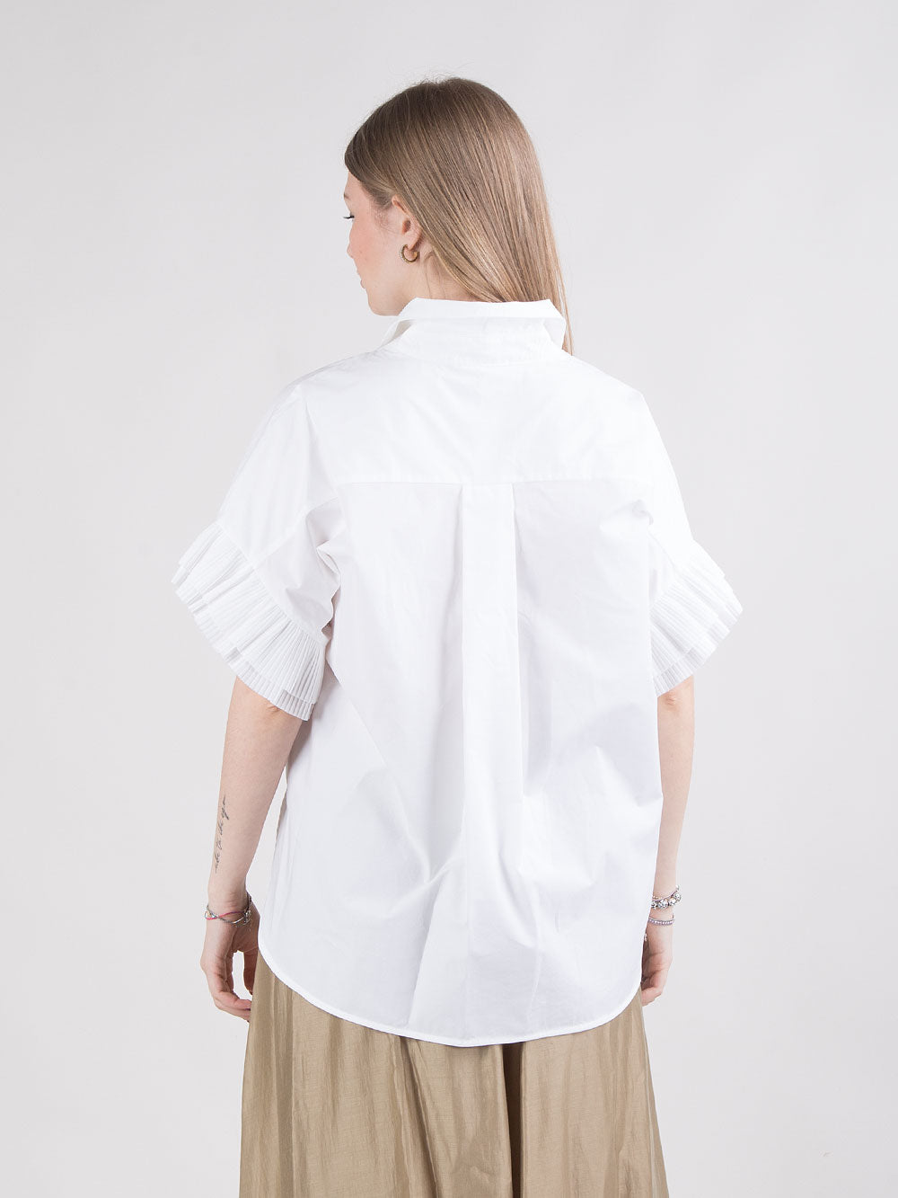 Camicia stile polo con dettagli plissettati