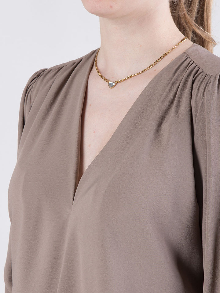 Blusa con scollo a V