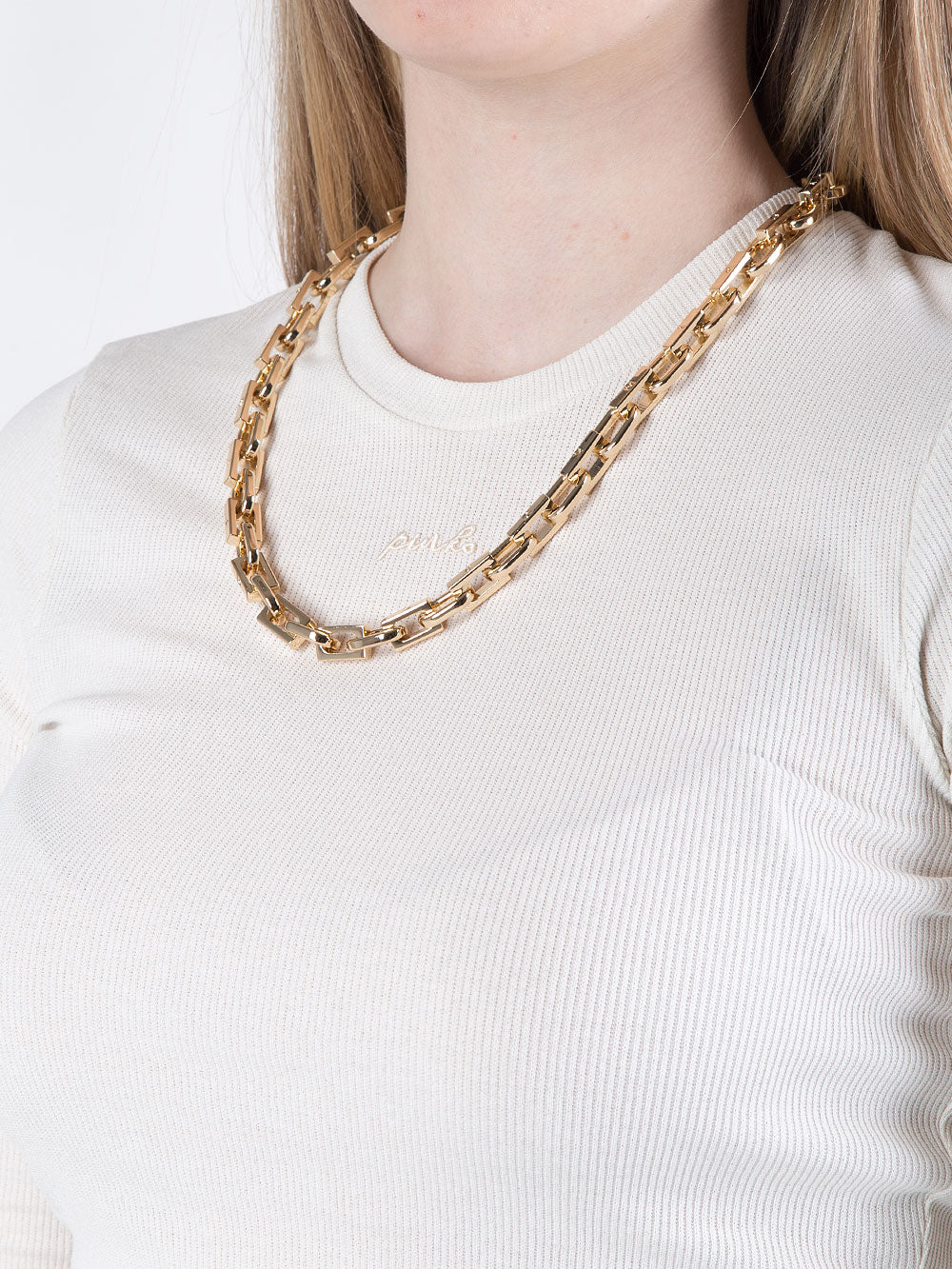 Maglia cropped con catena