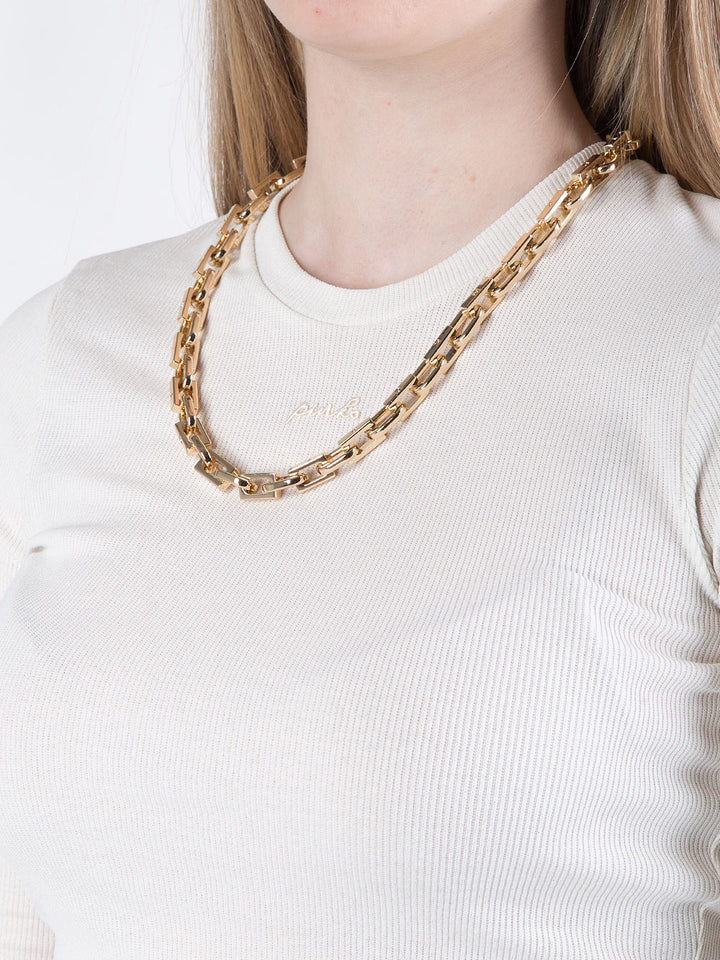 Maglia cropped con catena