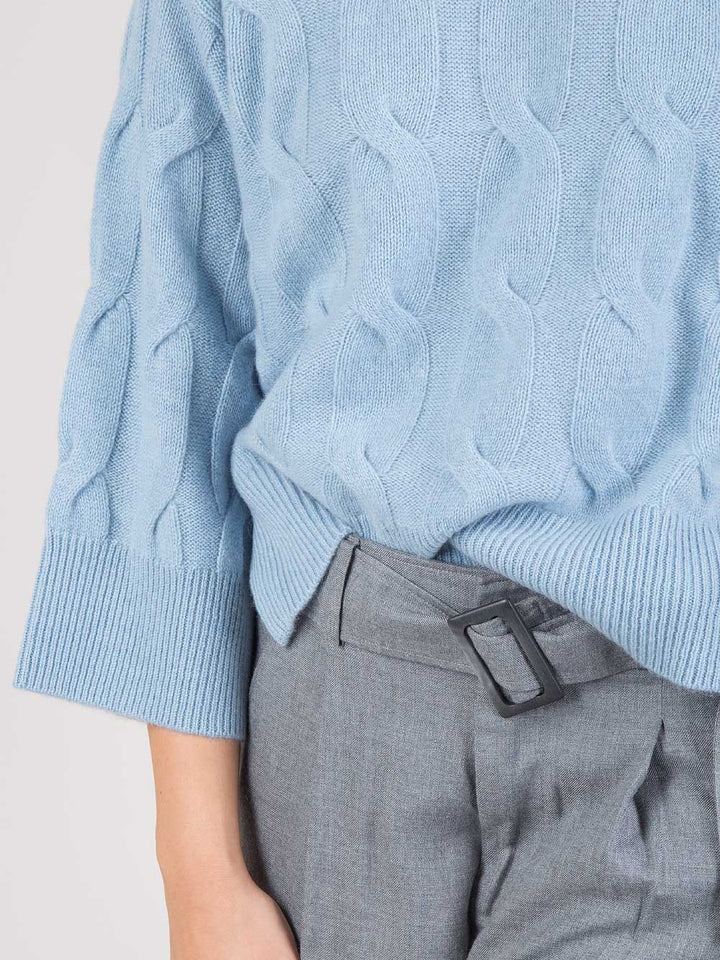 PONCHO IN MAGLIA A TRECCE