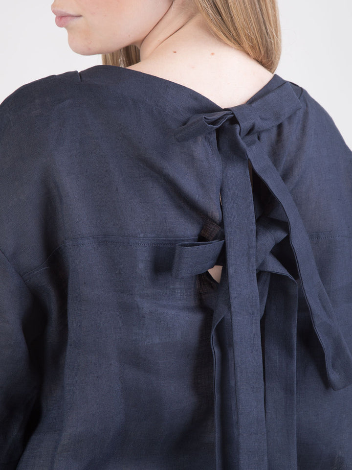 Blusa over in lino con fiocco