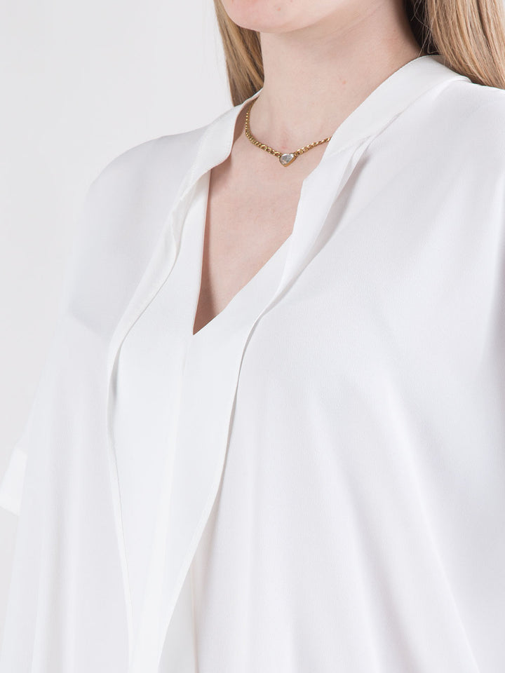 Blusa con rouches