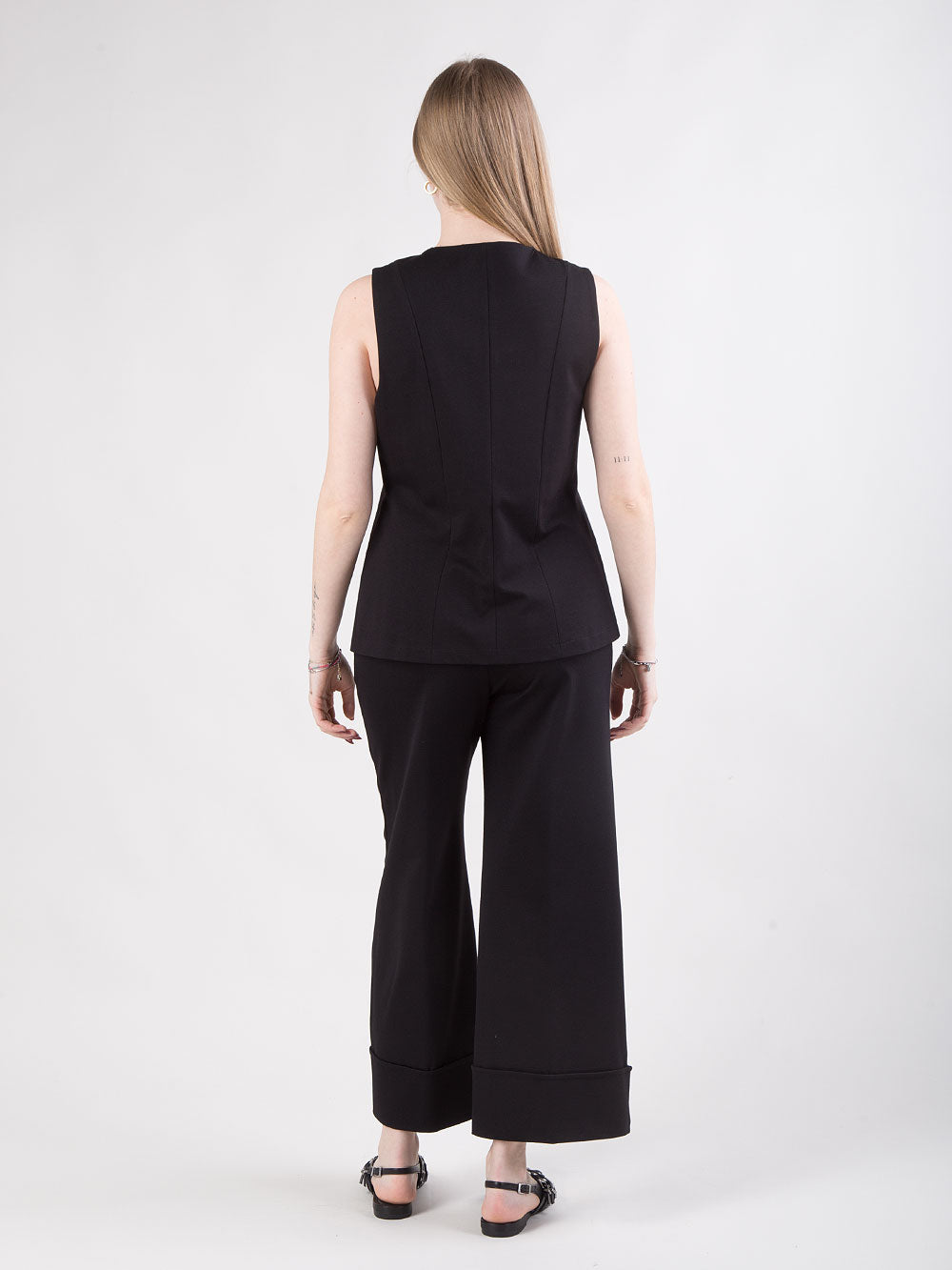 Pantalone nero con risvolto alto