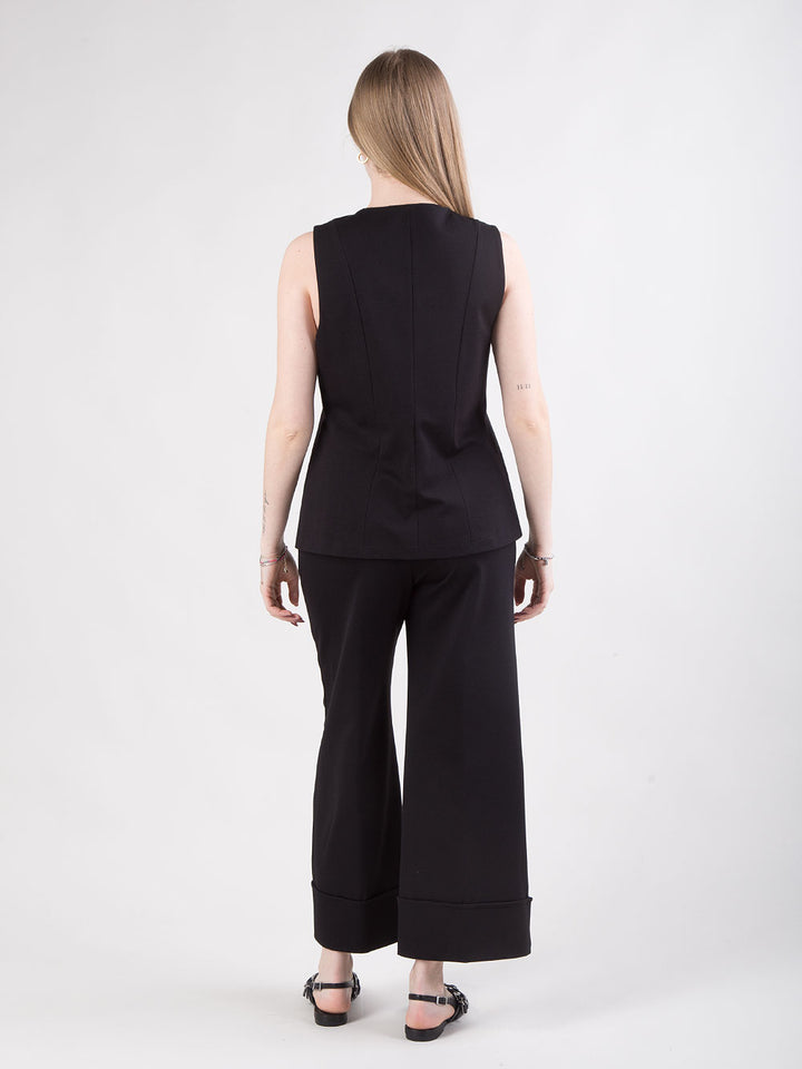 Pantalone nero con risvolto alto