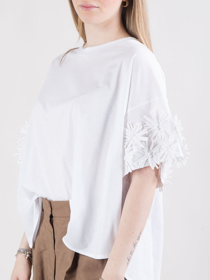 T-shirt over con dettaglio floreale