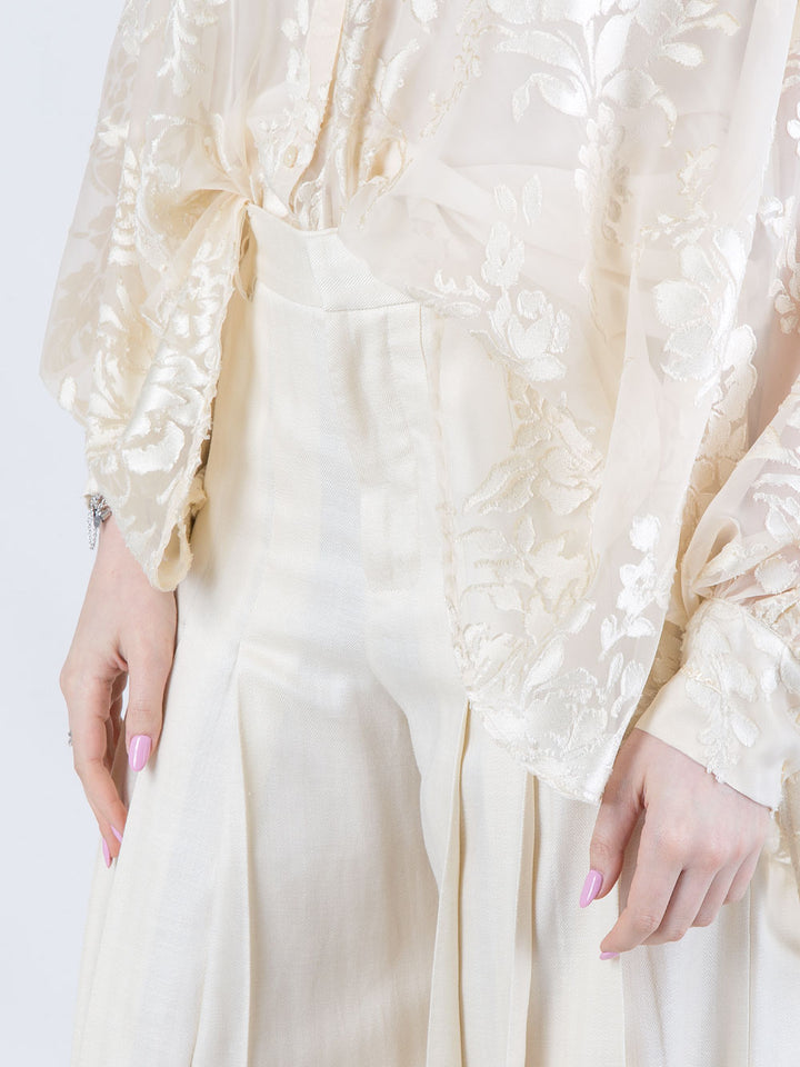 Pantalone ampio con pinces colore vaniglia
