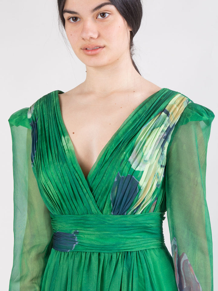 Abito lungo floreale con drappeggio e maniche in velo