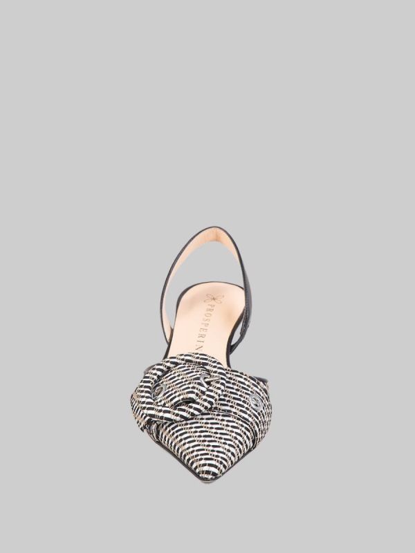 CHANEL MODEL DÉCOLLETÉ WITH BUCKLE PATTERN