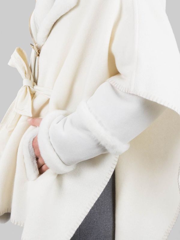 CAPE-STYLE JACKET MADE WITH ECO FUR AND SHEEPSKIN INSERTS