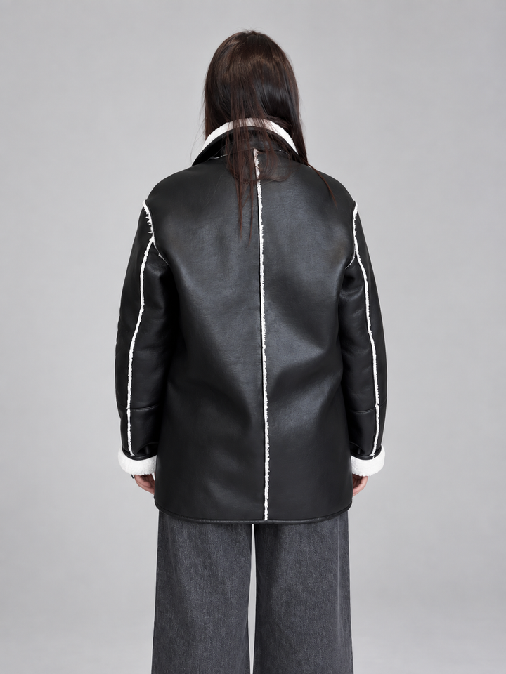 Giacca oversize effetto montone con ricami