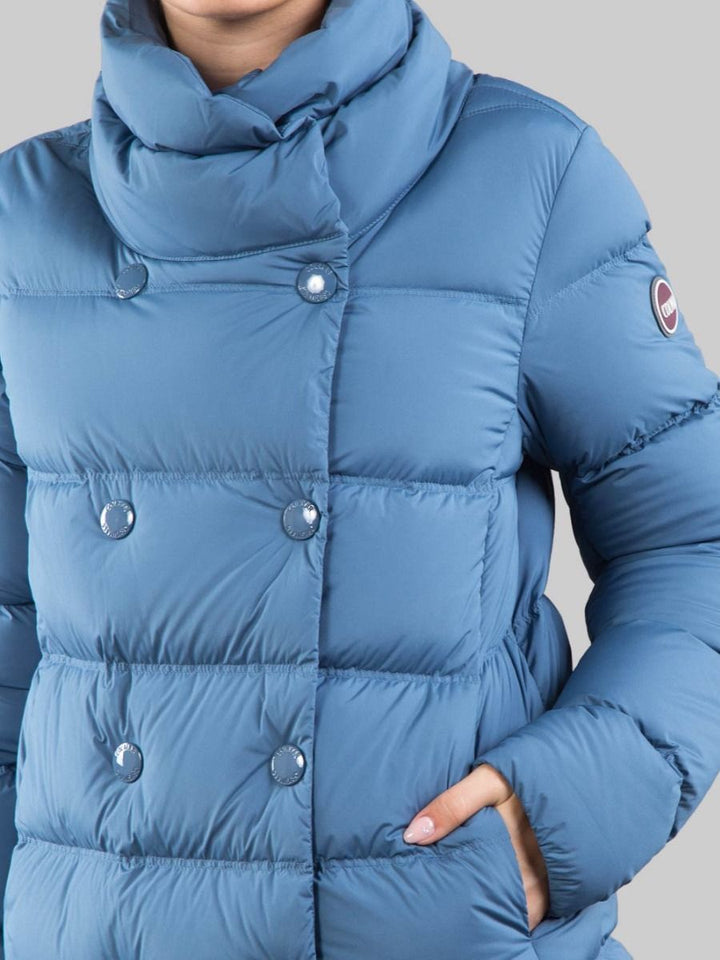 PIUMINO AZZURRO IN TESSUTO ELASTICIZZATO CON COLLO ALTO