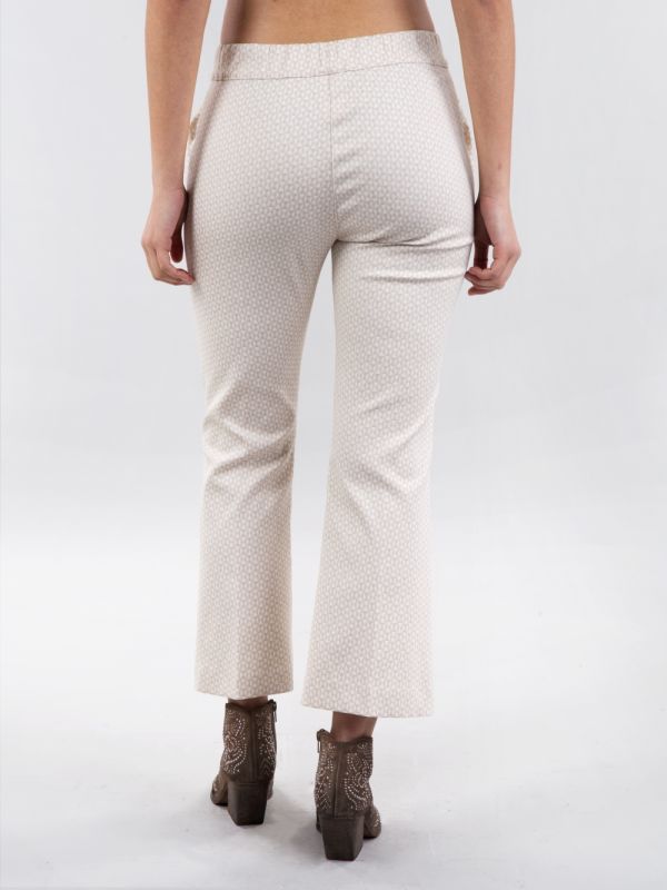 PANTALONI FLARE A FANTASIA JACQUARD CREMA E BIANCO