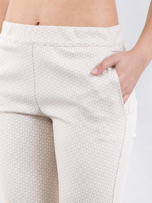 PANTALONI FLARE A FANTASIA JACQUARD CREMA E BIANCO