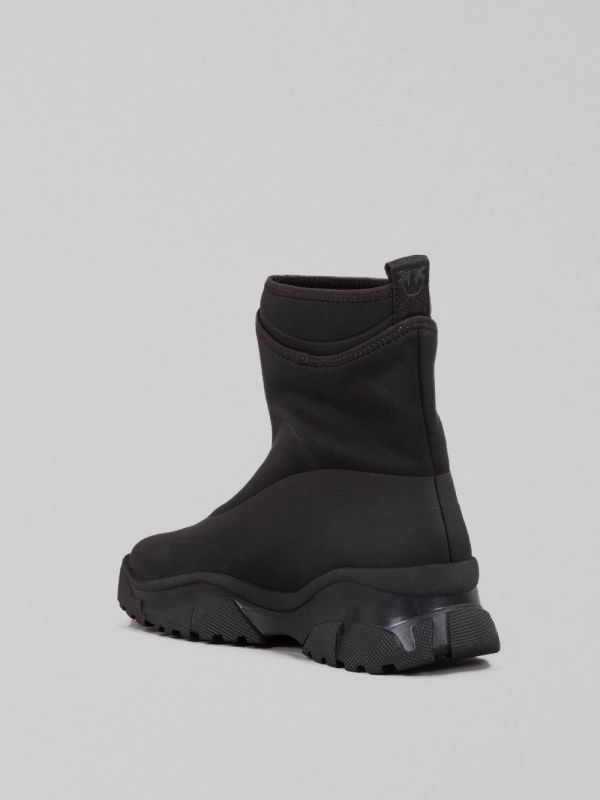 RUBBERIZED LEATHER AND NEOPRENE ANKLE BOOTS