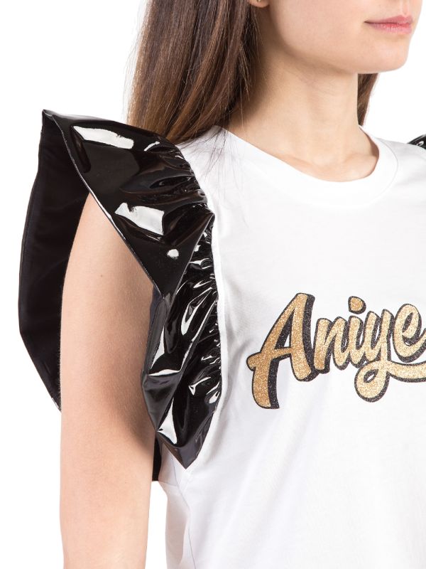 T-SHIRT IN COTONE CON MANICHE CORTE NERE CON VOLANT IN ECOPELLE