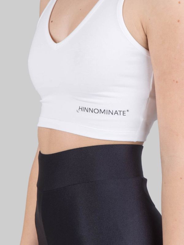 WHITE SLEEVELESS V-NECK CROPPED TOP