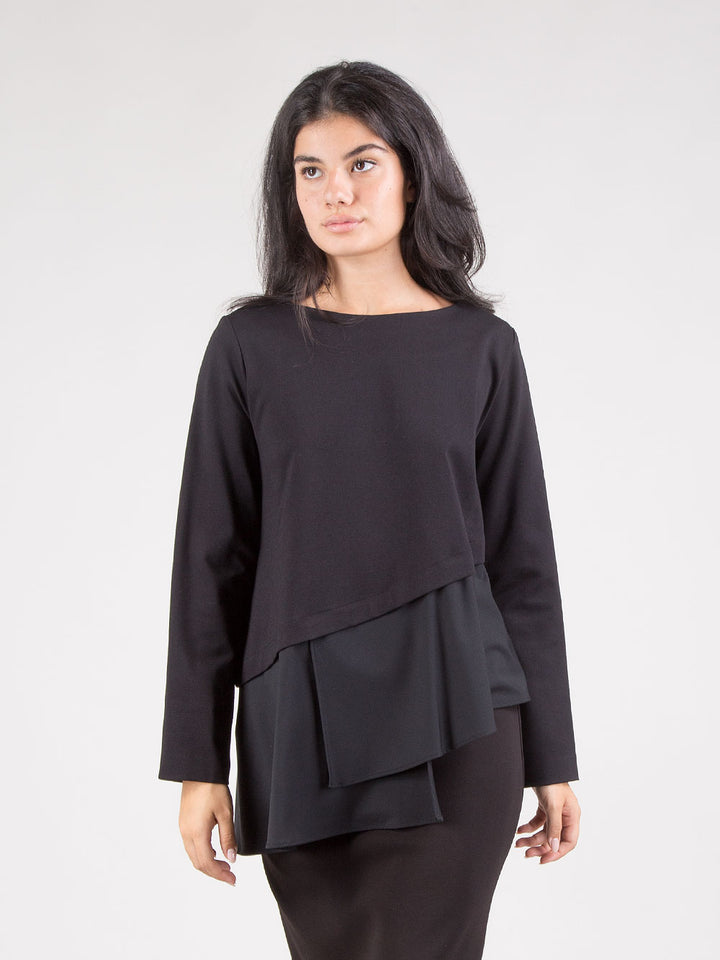 Blusa con balza