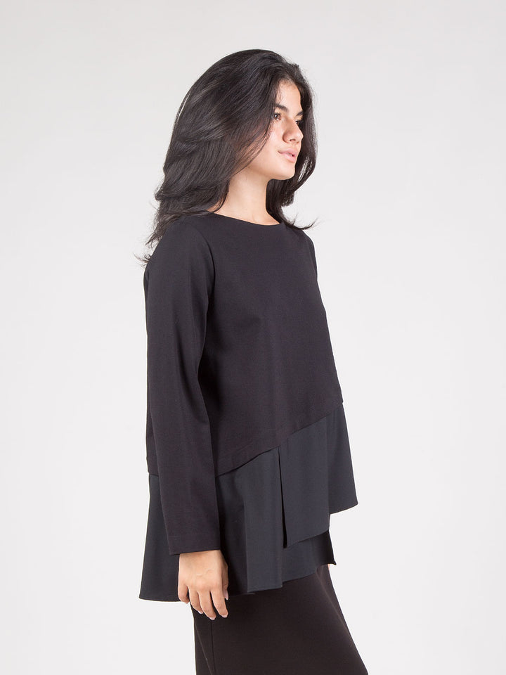 Blusa con balza