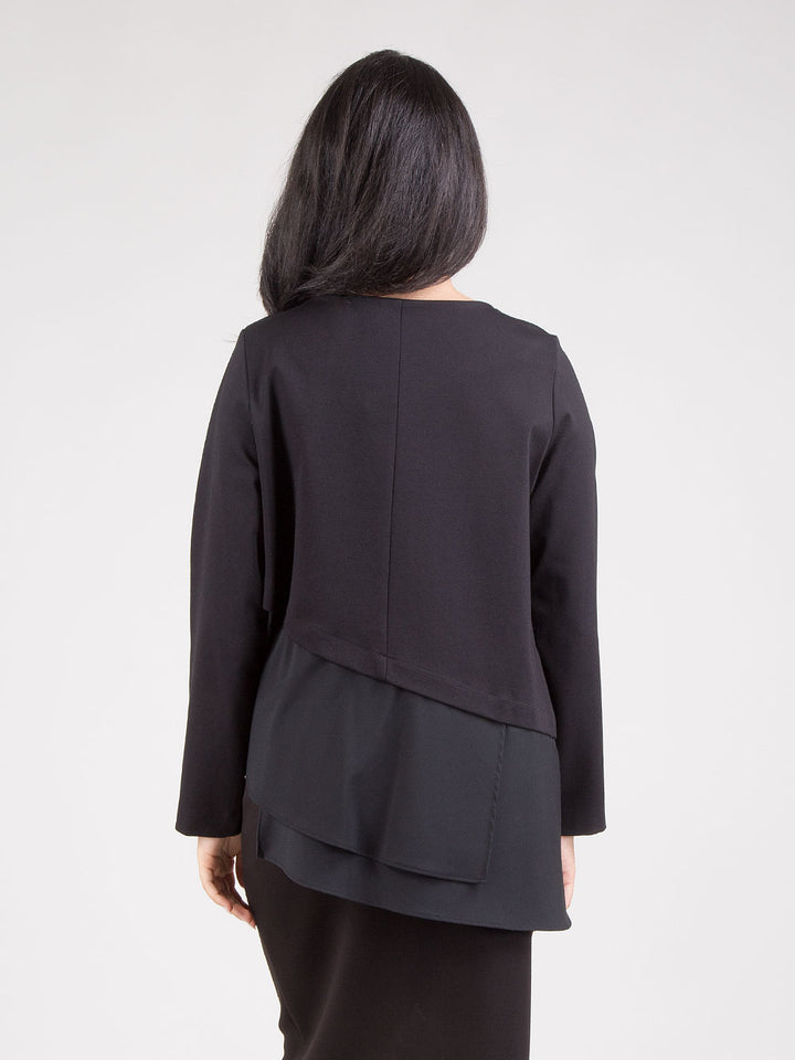 Blusa con balza