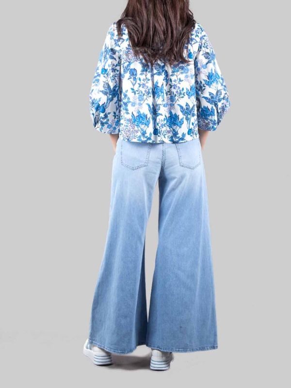 JEANS PALAZZO IN COTONE ELASTICIZZATO CON PICCOLE ROTTURE