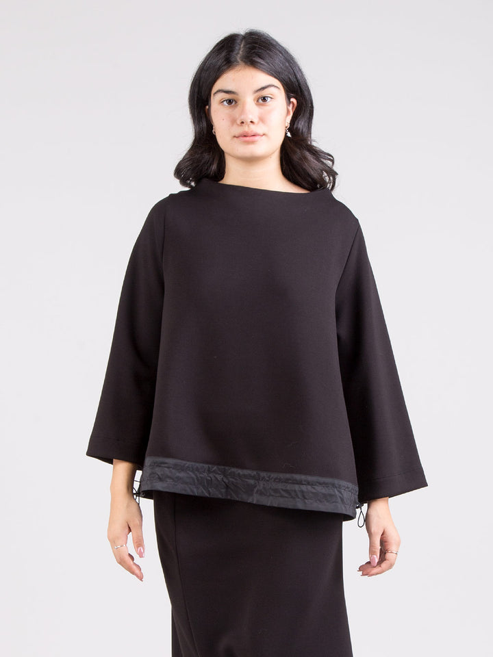 Blusa con coulisse