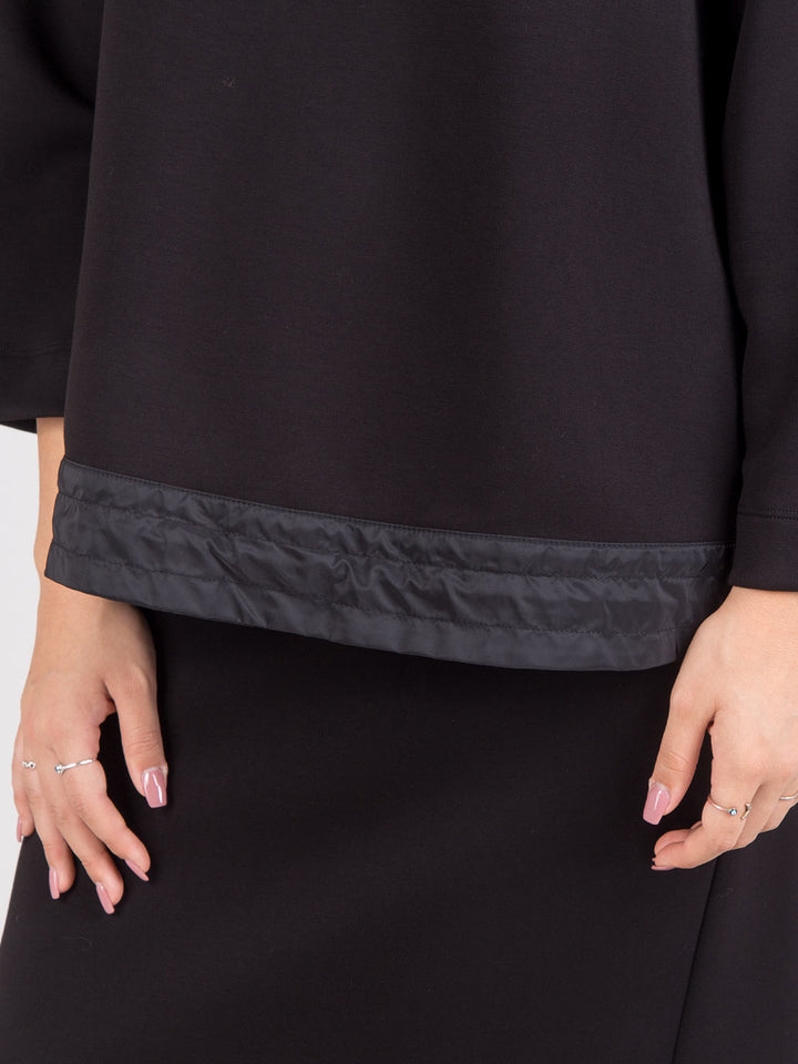 Blusa con coulisse