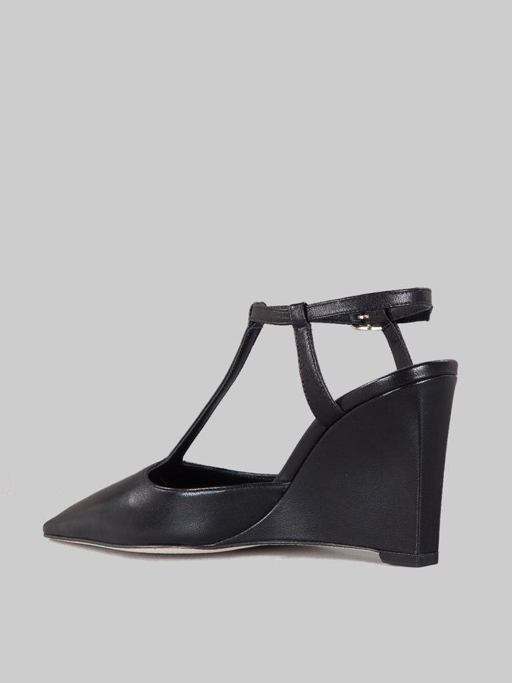 Slingback affusolata con zeppa