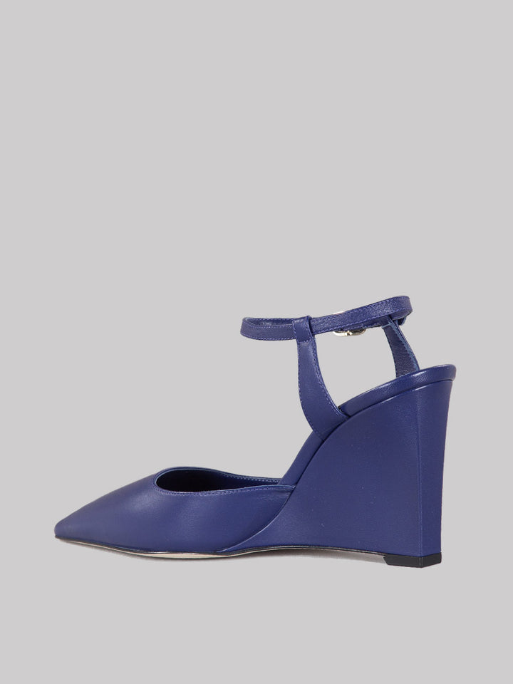 Slingback affusolata con zeppa